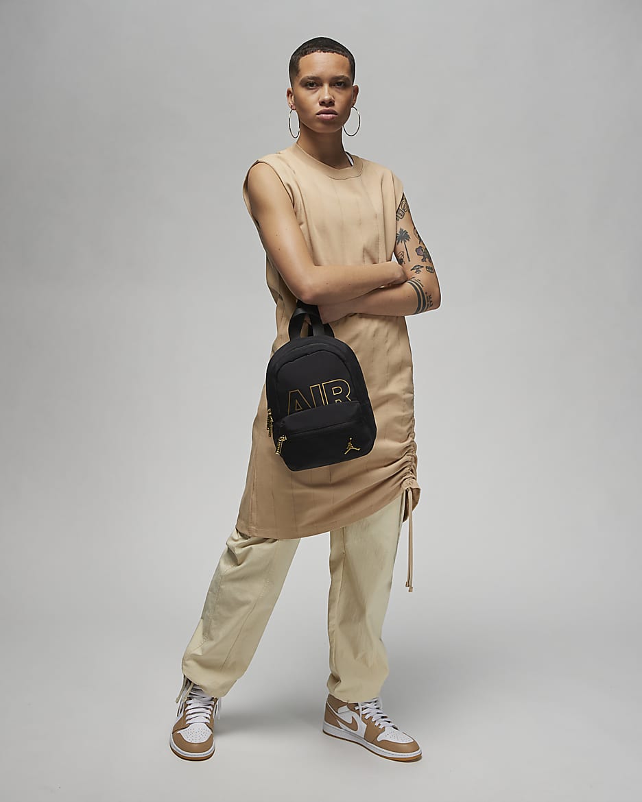 Nike backpack black and gold hot sale